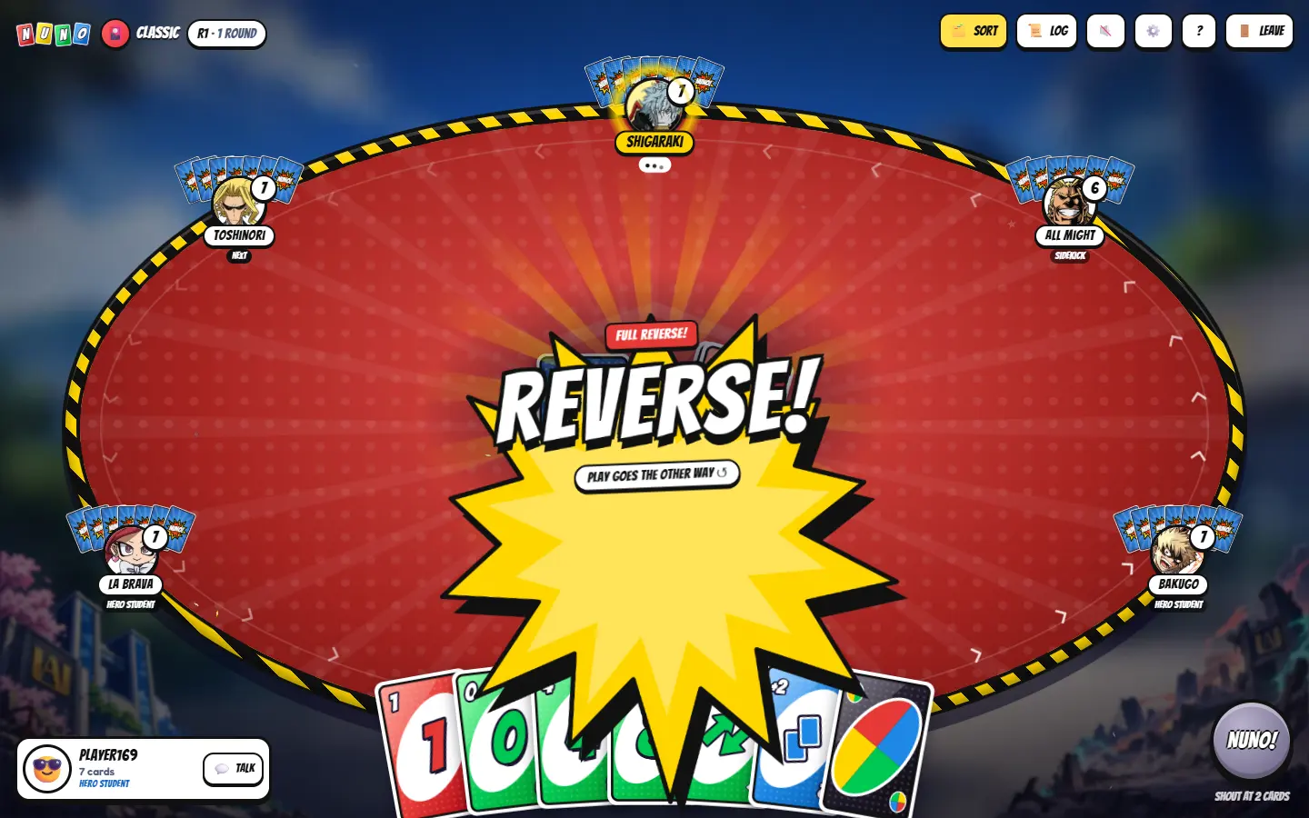A Hero Academy table: a comic ‘REVERSE!’ starburst over red felt inside a hazard-stripe rim